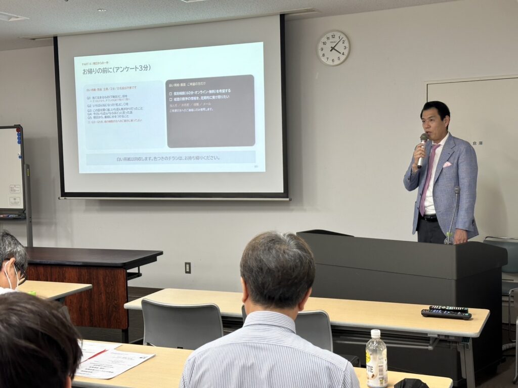 精神科病院の事務長の会で講演する馬醫光明